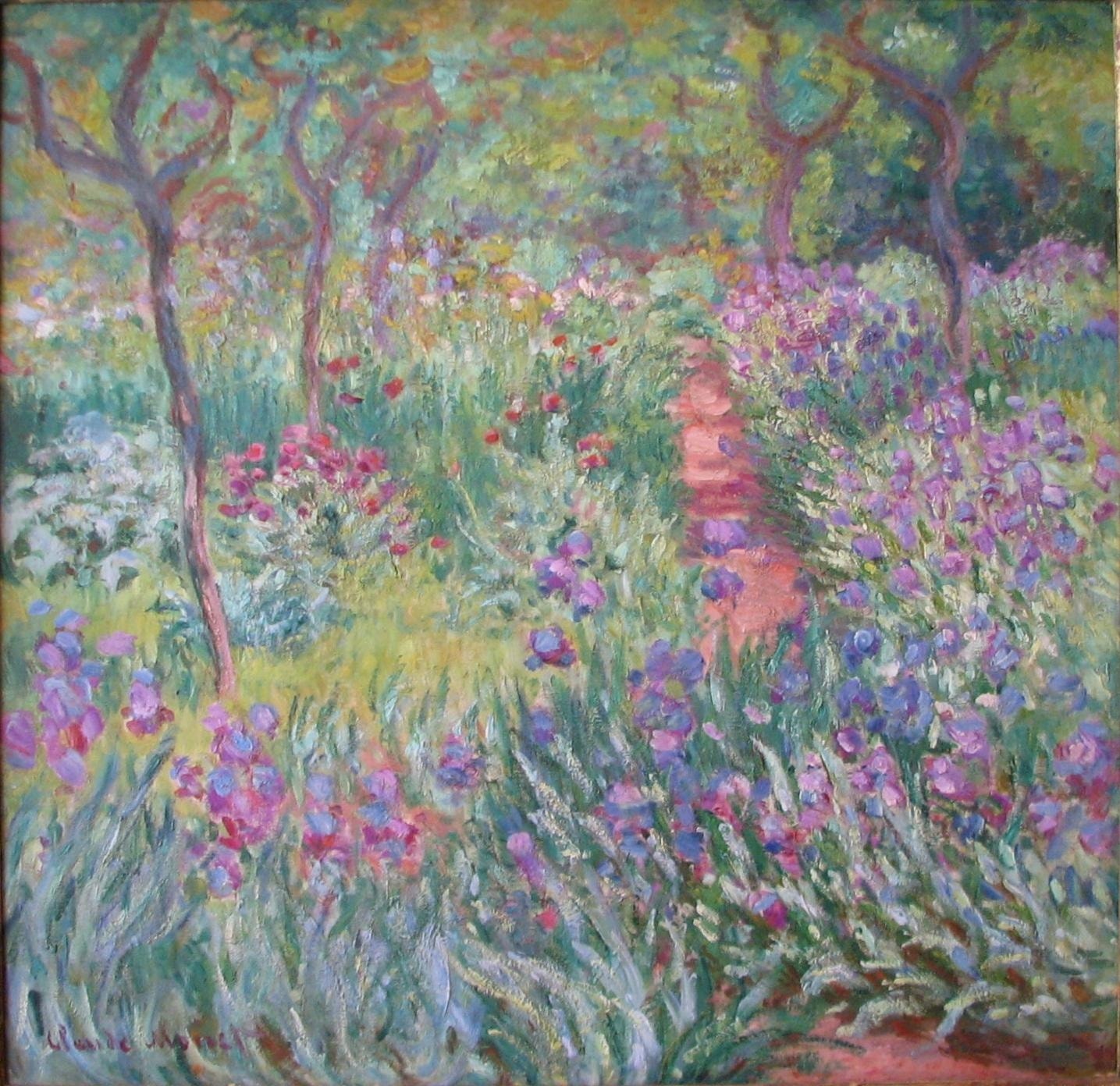 The Artist's Garden at Giverny by Claude Monet (1900) featuring Violet irises, Rose-colored path, Dappled, flickering light, Slender lilac tree trunks