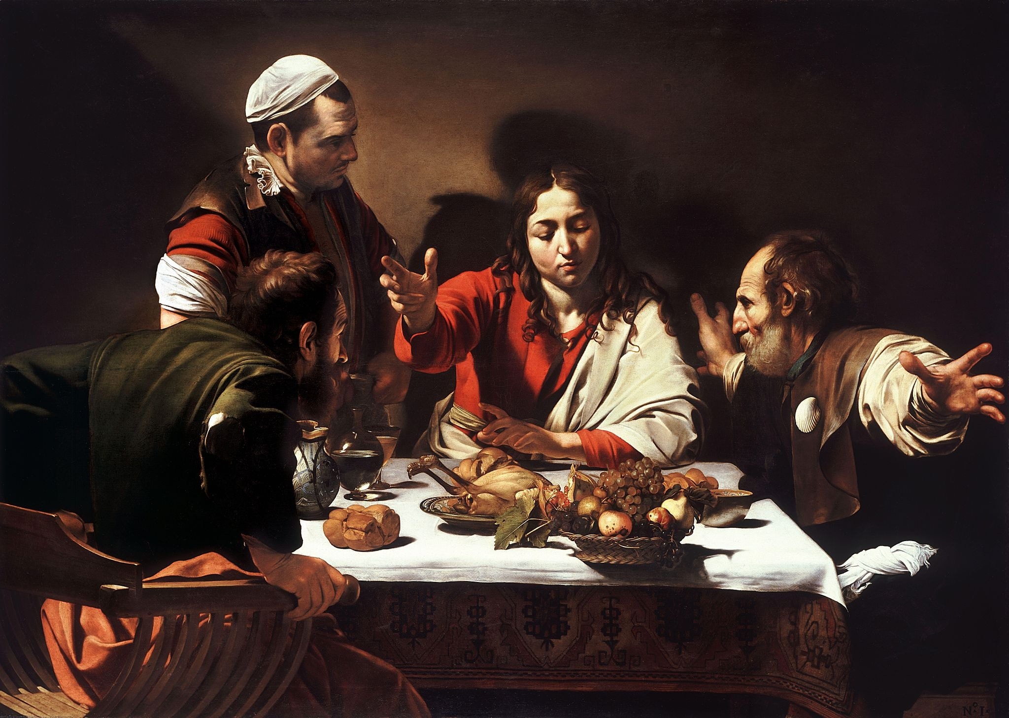 Click numbered symbols to learn about their meaning The Supper at Emmaus by Caravaggio (1601) featuring Bread (breaking of bread), Precarious basket of fruit, Pilgrim’s scallop shell