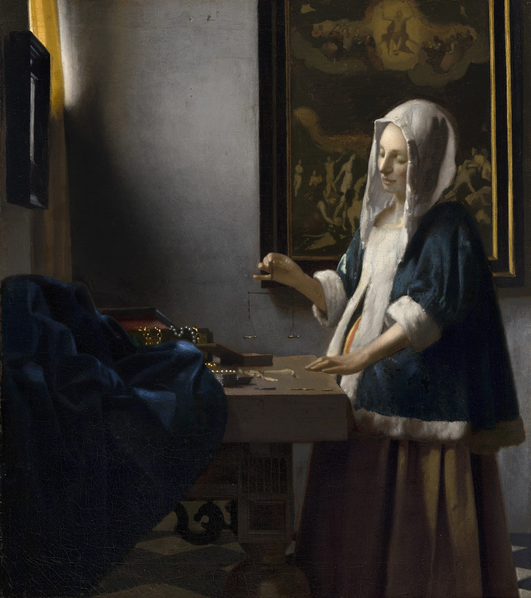 Woman Holding a Balance